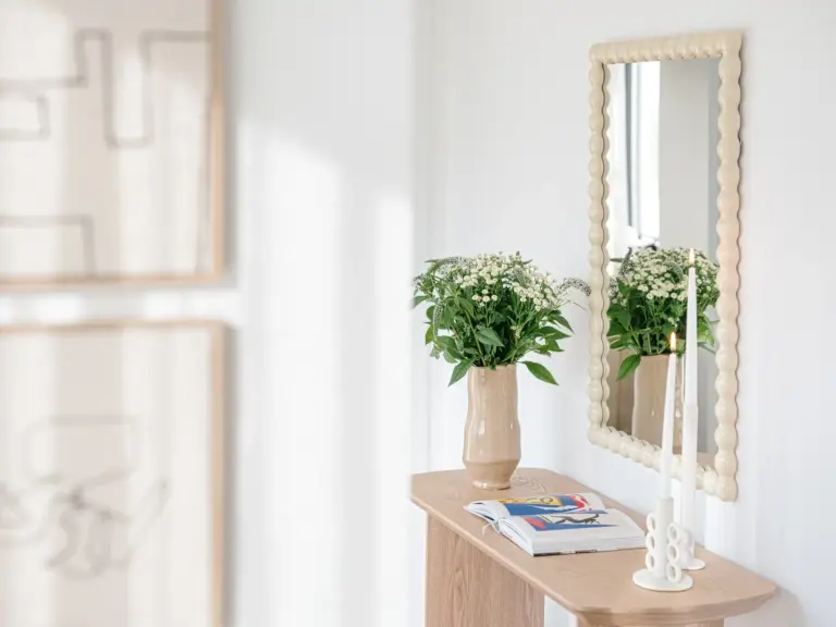 Hallway console table with mirror and flowers in OPAL GREEN