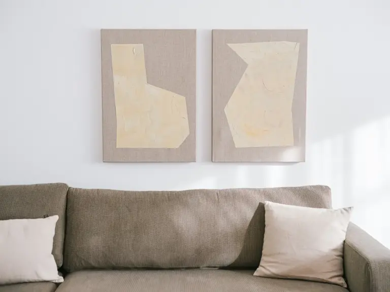 Wall art detail above sofa in OPAL GREEN TDY apartment near Ramstein Air Base
