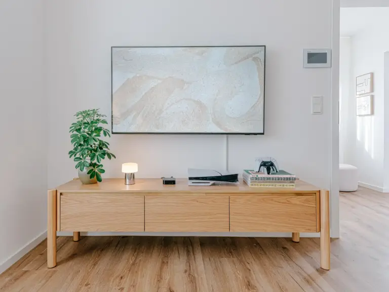 TV area with PlayStation 5 in OPAL GREEN TLA apartment near Ramstein Air Base