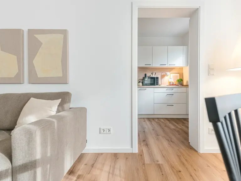 View from living area to kitchen in OPAL GREEN apartment near Ramstein Air Base
