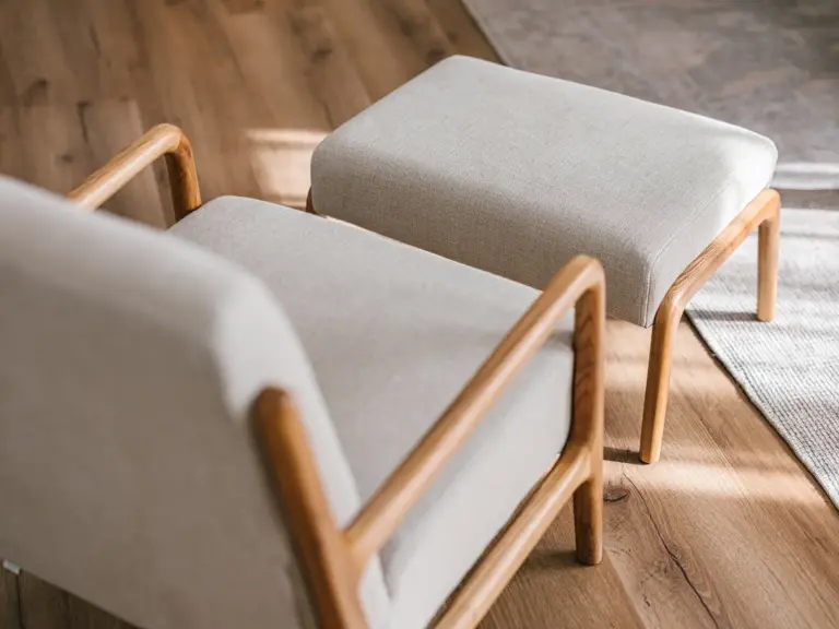 Armchair and ottoman detail in OPAL BLUE TDY and TLA apartment
