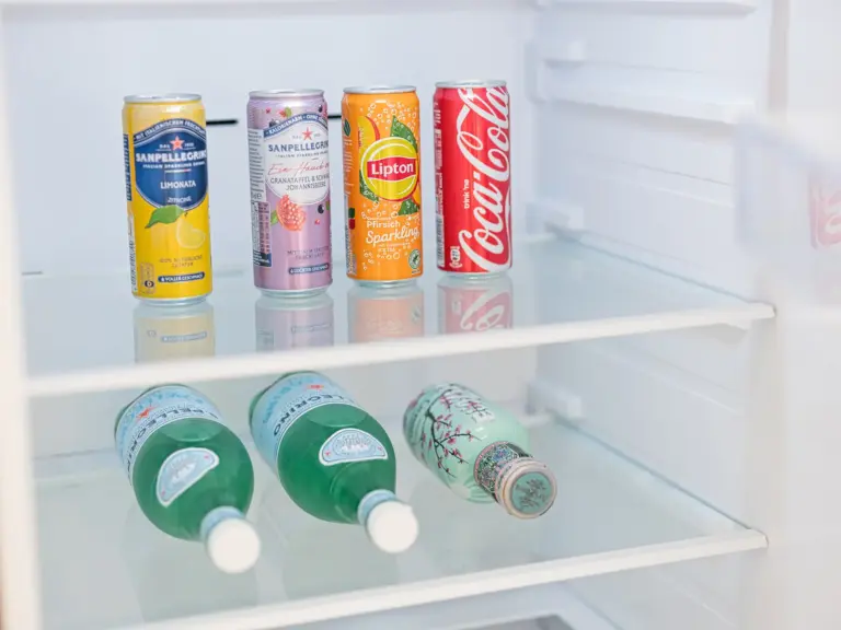 Selection of welcome drinks in refrigerator of OPAL BLUE TLA apartment