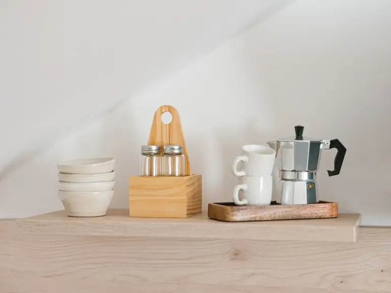 Coffee station with moka pot, cups and bowls in OPAL BLUE TLA apartment near Ramstein