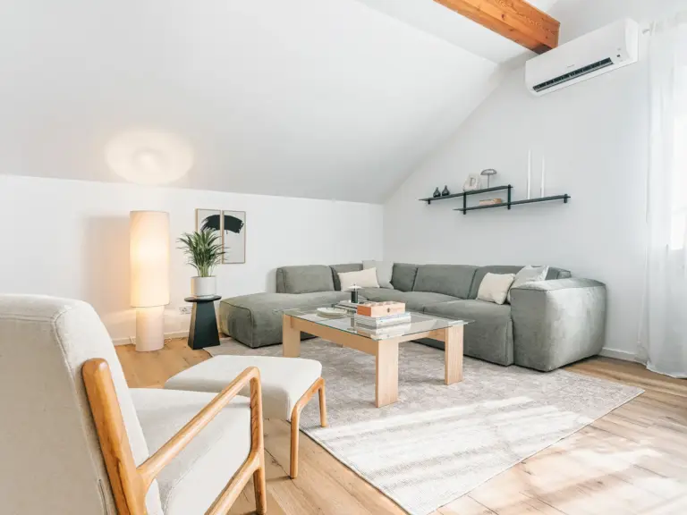 Corner sofa lounge area in OPAL BLUE furnished TLA apartment KMC