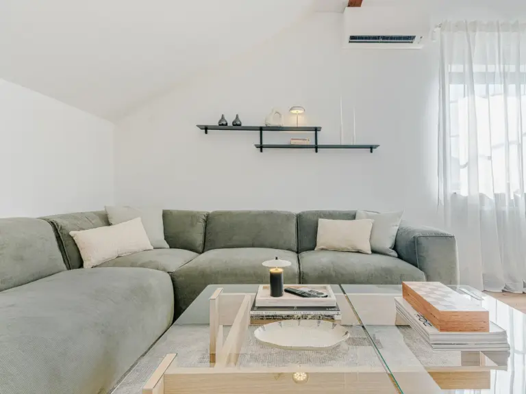 Sectional sofa and coffee table in OPAL BLUE TDY and TLA apartment