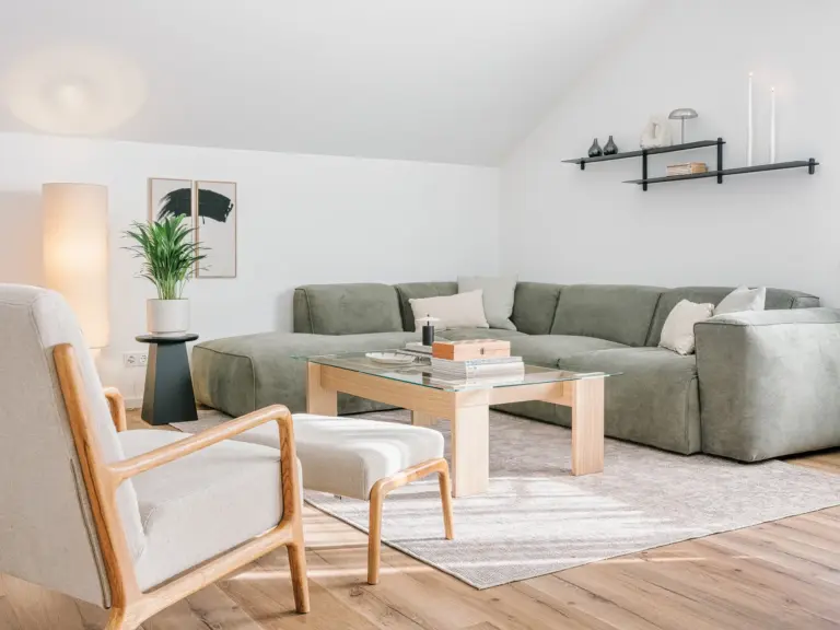 Corner sofa lounge area in OPAL BLUE furnished TLA apartment KMC