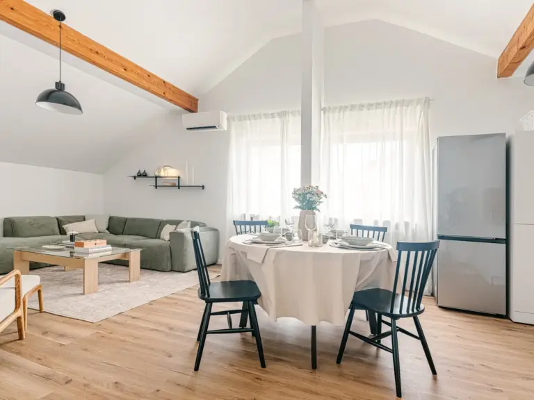 Open plan living and dining area in OPAL BLUE TDY and TLA apartment