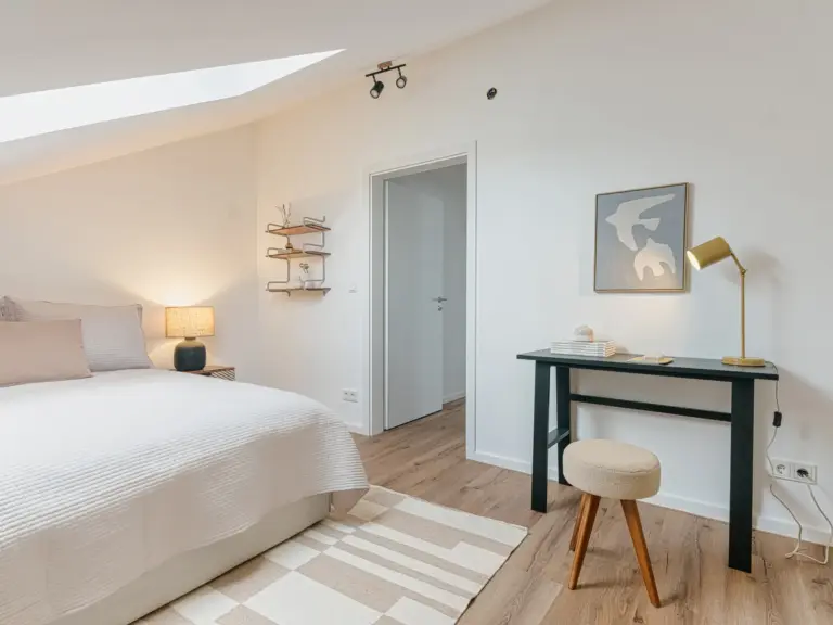 Second bedroom with bed and desk in OPAL BLUE