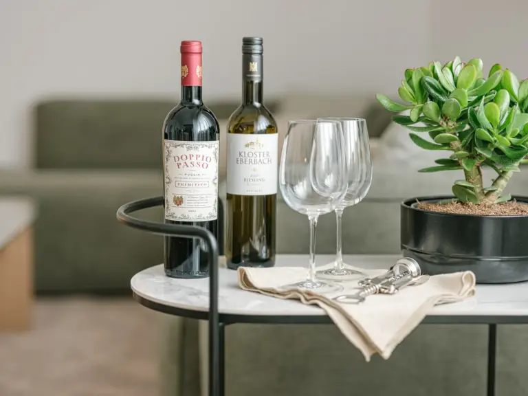 Wine bottles and glasses in OPAL BLUE TDY and TLA apartment