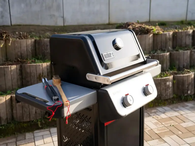 Weber gas grill on terrace at Opal White apartment