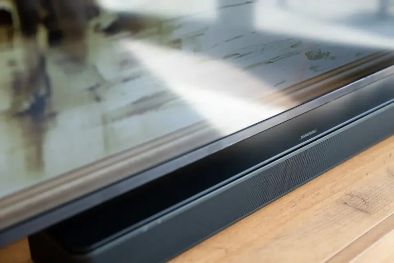 BOSE Soundbar audio system below a TV in Opal White apartment
