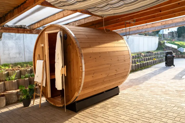 Outdoor wooden barrel sauna on terrace at Opal apartment house