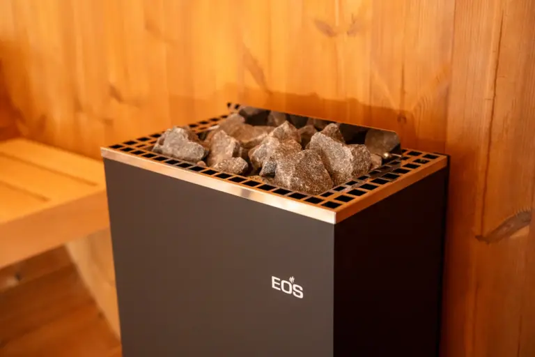 Modern EOS sauna heater with stones in Opal sauna