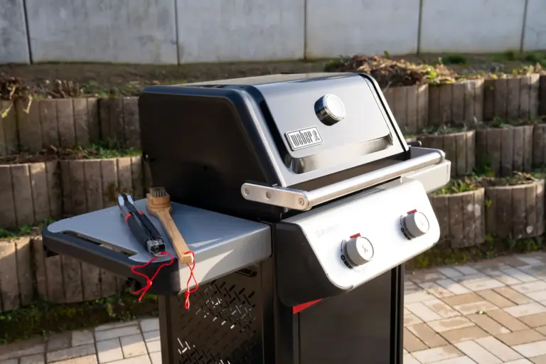 Weber gas grill on terrace at Opal White apartment