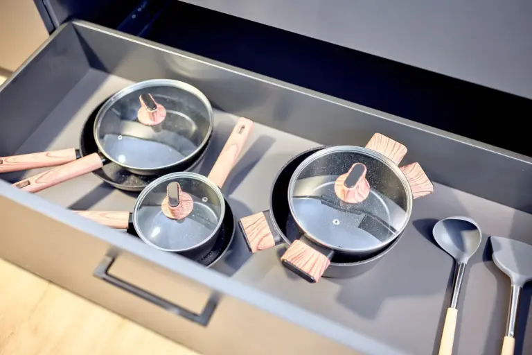 CORAL BLOOM kitchen drawer with pots, pans and cooking utensils