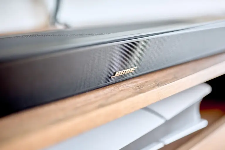 Close-up of the BOSE soundbar beneath the Smart TV in the CORAL SUN living room