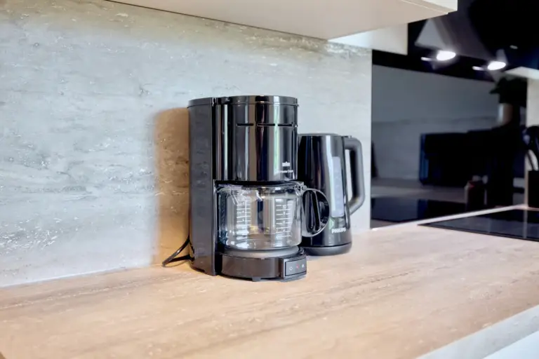 Coffee maker and electric kettle on the CORAL SUN kitchen countertop