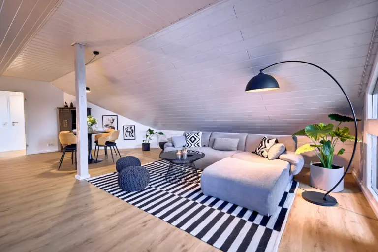Open-plan living room and dining area at Stay Eden AMBER GLOW
