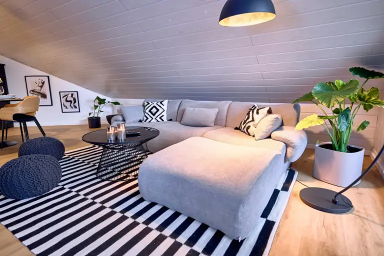 Spacious living room with sectional sofa at Stay Eden AMBER GLOW