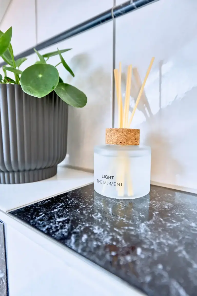 Bathroom decor and fragrance diffuser at Stay Eden AMBER GLOW