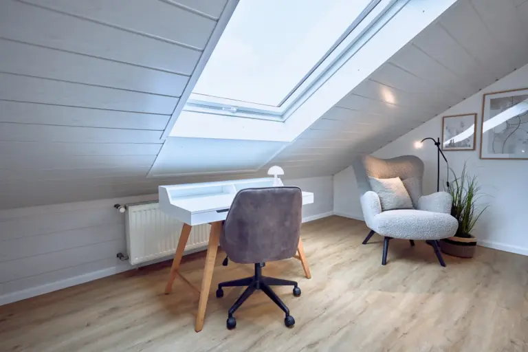 Dedicated workspace with desk and comfortable seating at Stay Eden AMBER GLOW