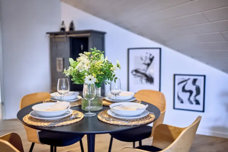 Modern dining area with table for four at Stay Eden AMBER GLOW
