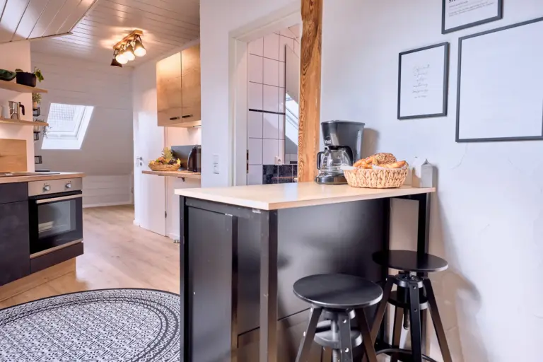 Kitchen breakfast bar with seating at Stay Eden AMBER GLOW