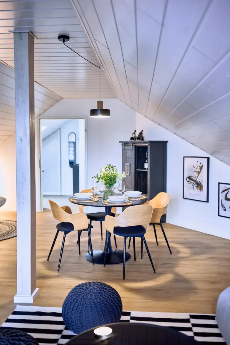 Open-plan dining and living area at Stay Eden AMBER GLOW