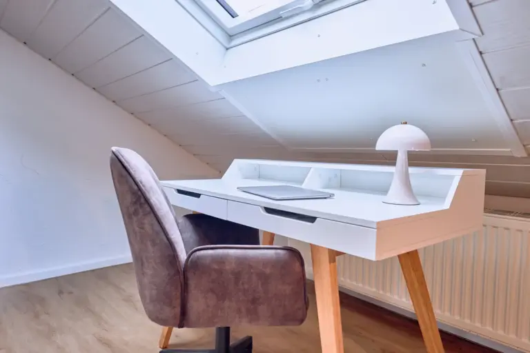 Dedicated workspace with desk and skylight at Stay Eden AMBER GLOW