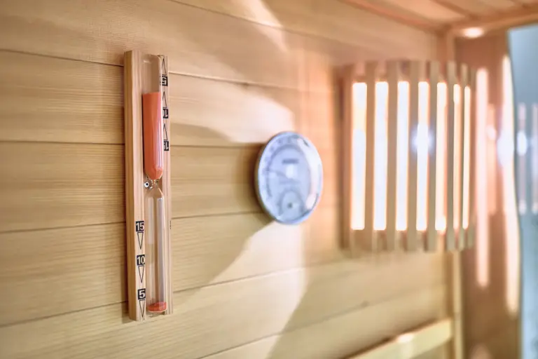 Sauna timer and temperature gauge at AMBER GOLD and AMBER GLOW