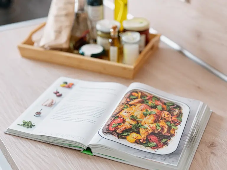 Cookbook and cooking essentials in the kitchen at PEARL WHITE