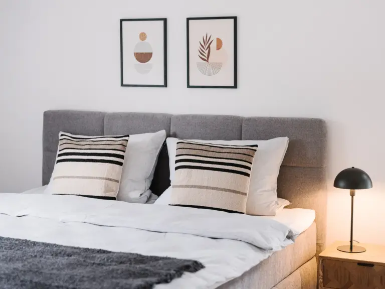 Comfortable king-size bed in the master bedroom at RUBY RED