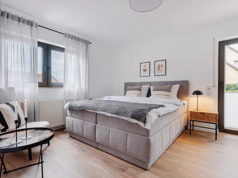 Master bedroom with king-size bed at RUBY RED