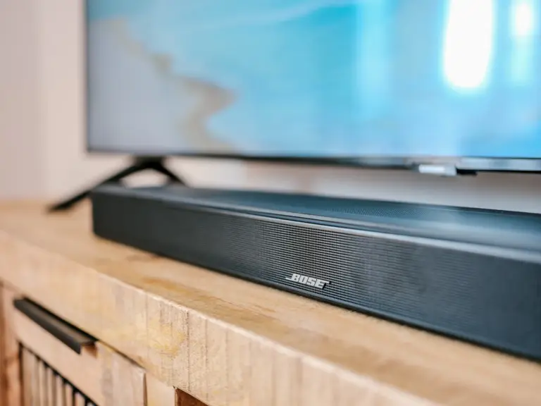 Bose soundbar below the TV at PEARL WHITE