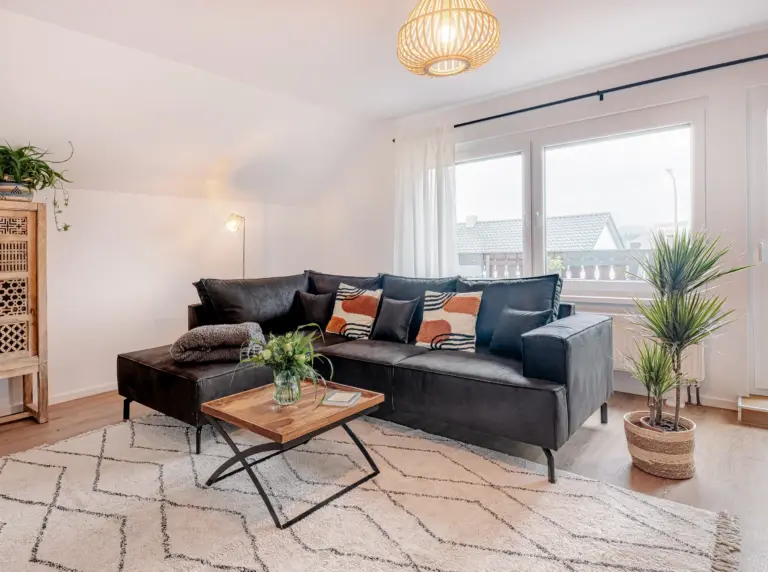 Comfortable living room with large sectional sofa at PEARL SILVER