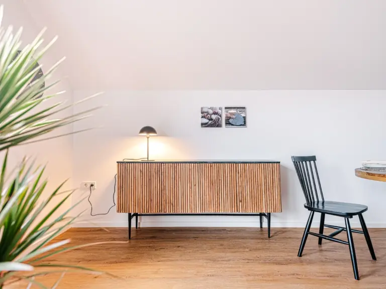 Wooden sideboard and dining area at PEARL SILVER
