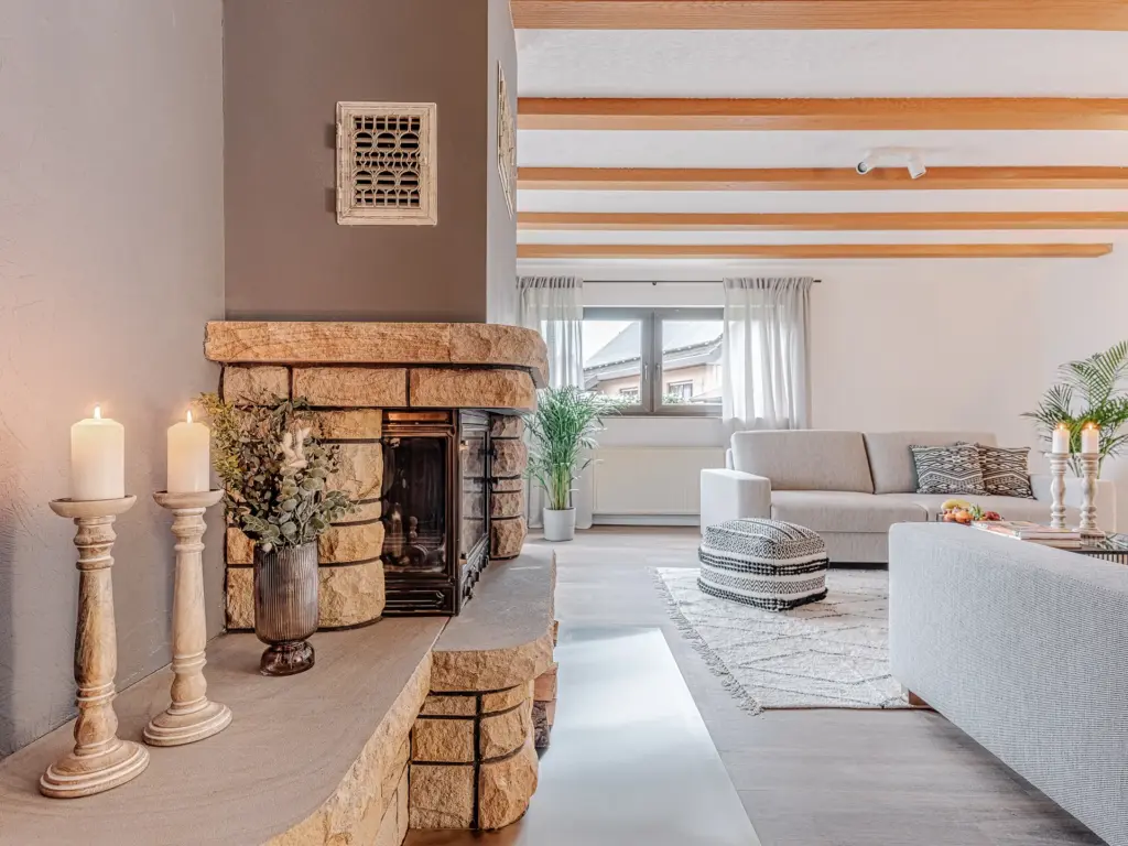 Bright living room with fireplace at RUBY RED