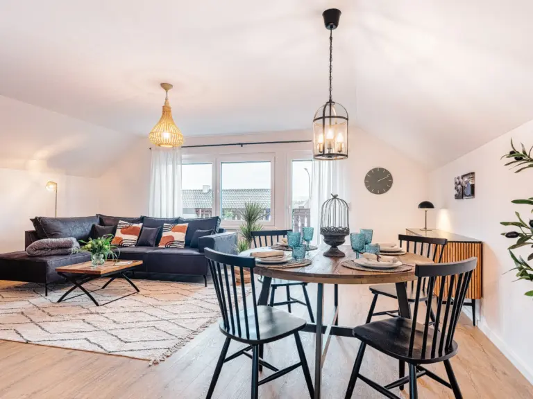 Open-plan dining and living area at PEARL SILVER