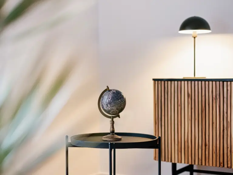 Decorative globe and modern furniture in the PEARL SILVER living room