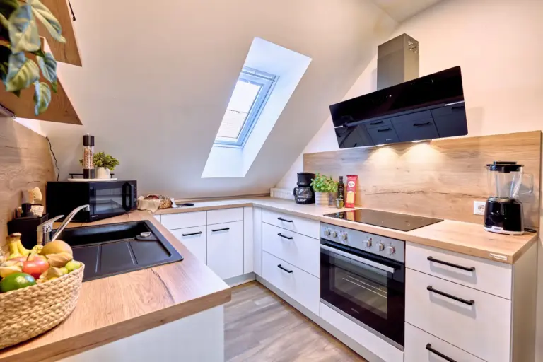 Fully equipped kitchen with oven, cooktop and blender at RUBY NOIR