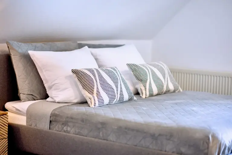 Comfortable king-size bed in the master bedroom at RUBY NOIR