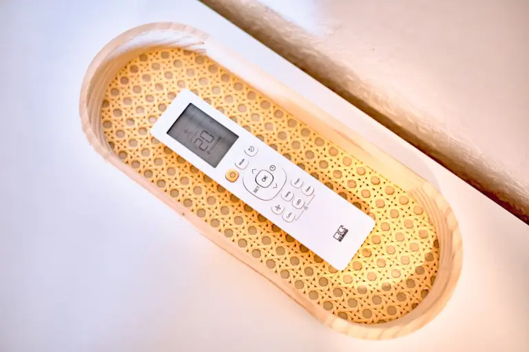 Air conditioning remote in the second bedroom at RUBY NOIR