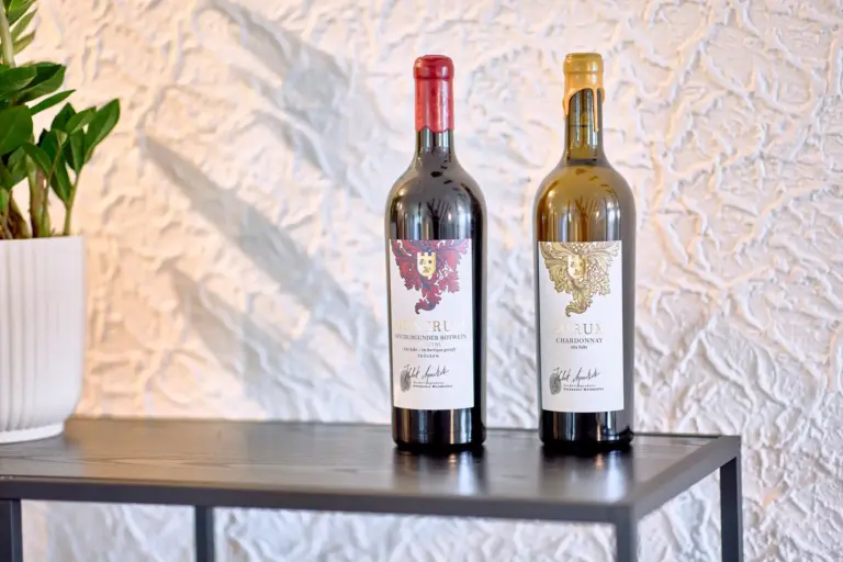 Wine bottles displayed in the dining area at RUBY NOIR