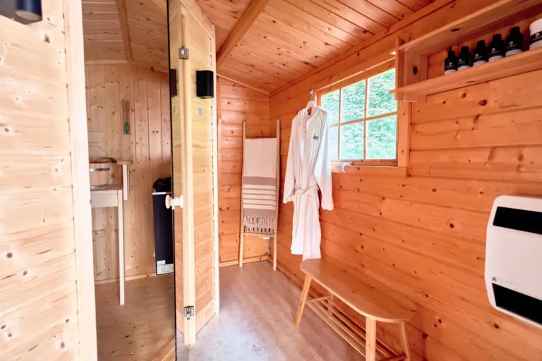 Private sauna area with bathrobe at RUBY RED and RUBY NOIR