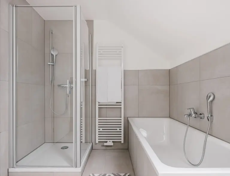Bathroom with separate shower and bathtub at PEARL SILVER