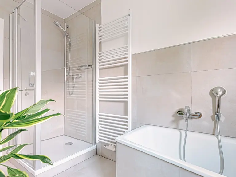 Bathroom with separate shower and bathtub at PEARL WHITE