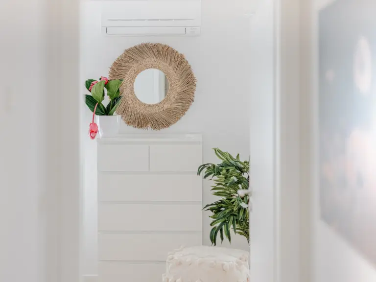 Decorative mirror and storage in the PEARL SILVER bedroom