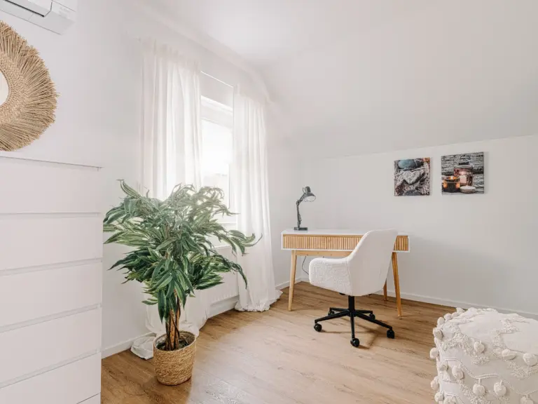 Dedicated workspace with desk and office chair at PEARL SILVER